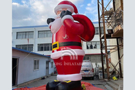 Гигантский раздувной Санта Клаус с украшениями рождества сумки подарка на открытом воздухе